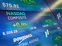 NASDAQ crosses 6000-point milestone