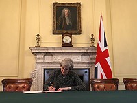 May signs letter to trigger Brexit